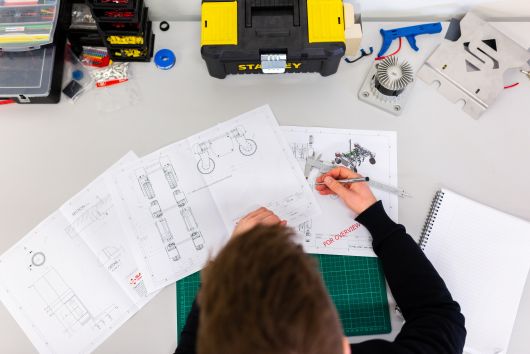 An engineer creates blueprints